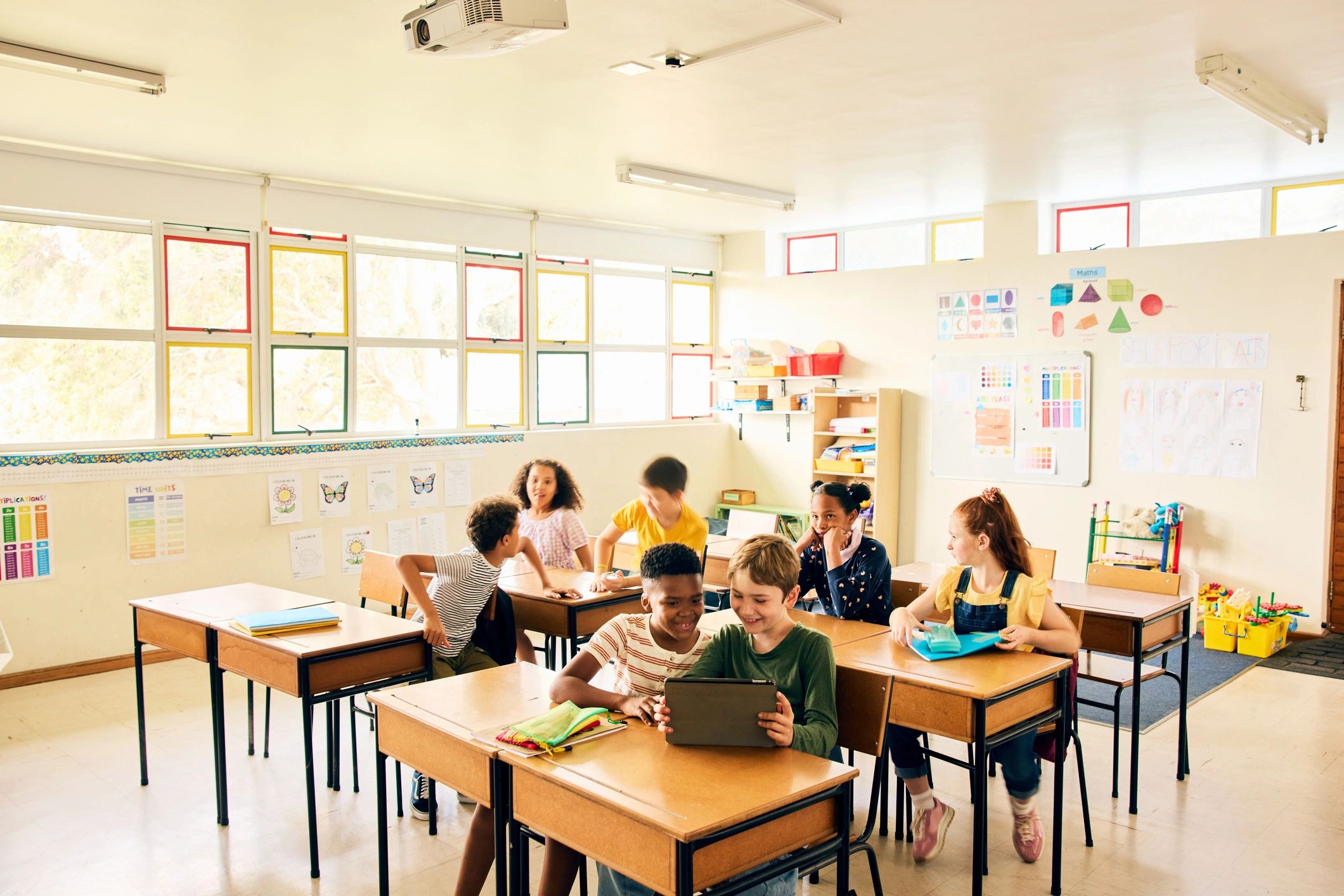 Students collaborating in a colorful classroom