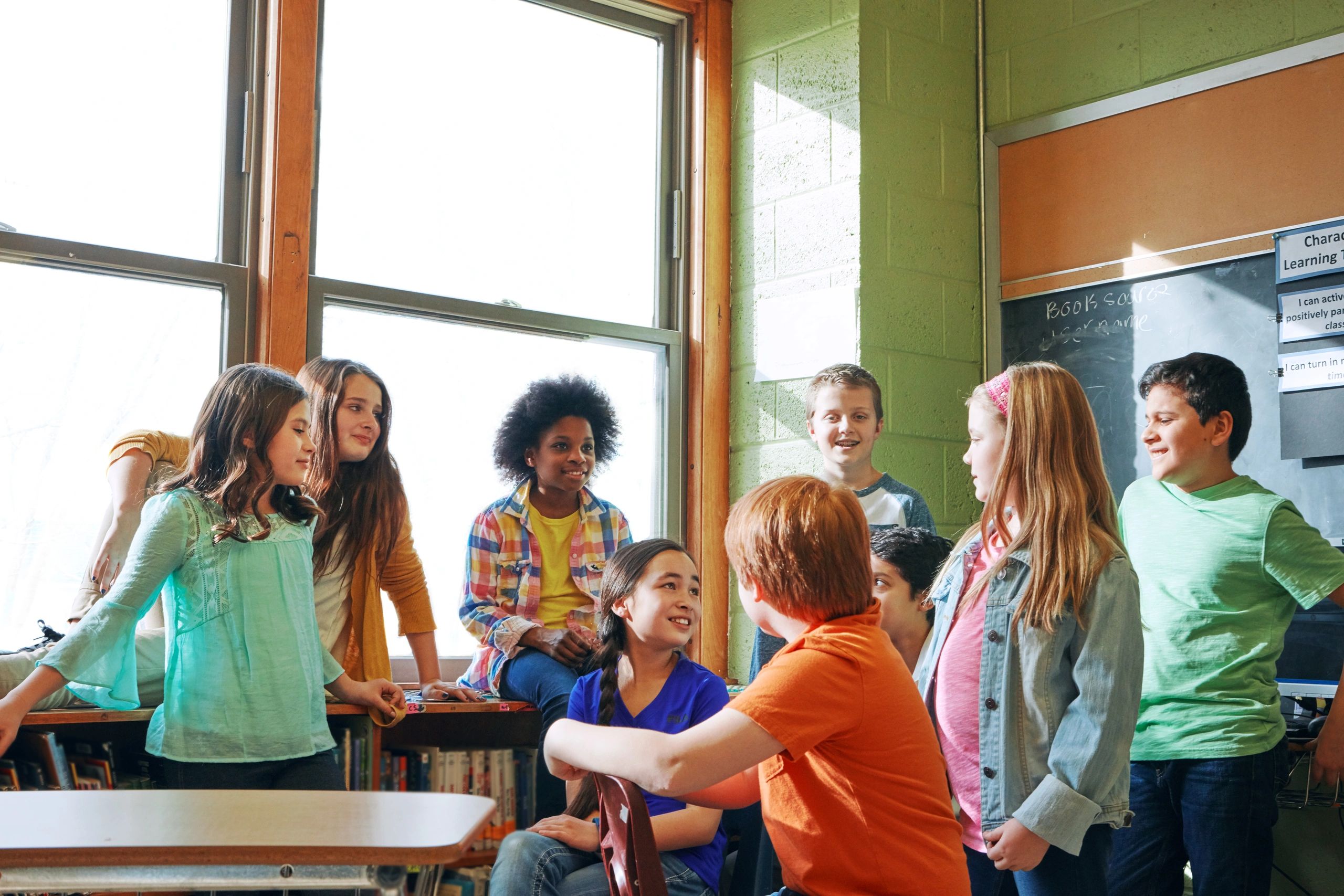 Elementary students collaborating during class